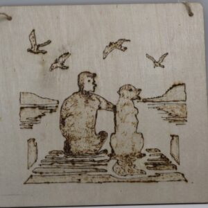 man with dog by lake