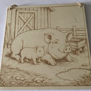A plaque of a large and small pig