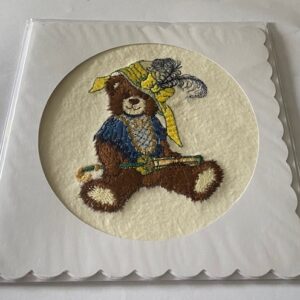 A brown bear on a card