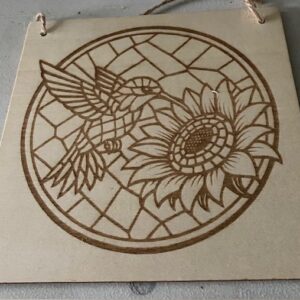 A stain glass effect of a bird and flower