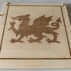 A plaque with a welsh dragon on it