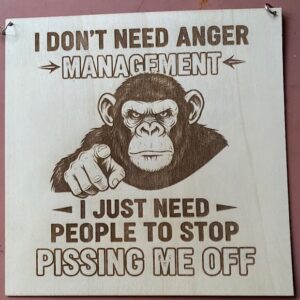 A plaque with a monkey