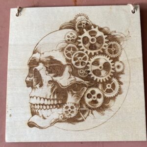 A skull with gear wheels 0n it